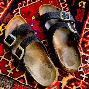 Birkenstock Arizona sandals. Black reptile print size 40 (same as US 9).